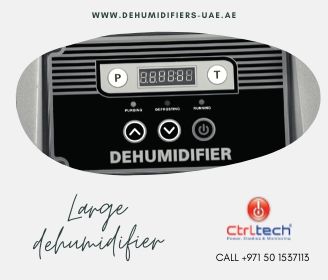 Large dehumidifier has operating panel.